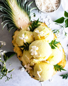 Vegan Pina Colada Ice Cream served in a pineapple.