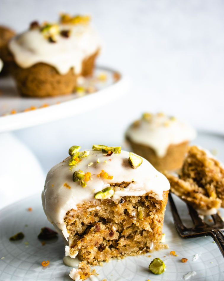 Mini Vegan Orange and Pistachio cake cut in half.