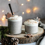 Gingerbread Chia Pudding served in 2 glasses, topped with yogurt.