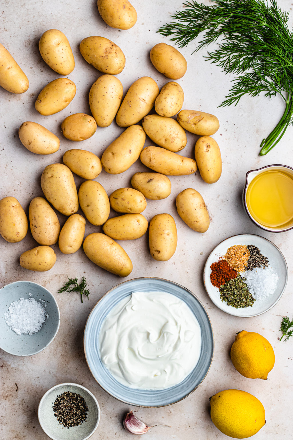 Roasted Greek Potatoes with Lemon Tzatziki - The Delicious plate