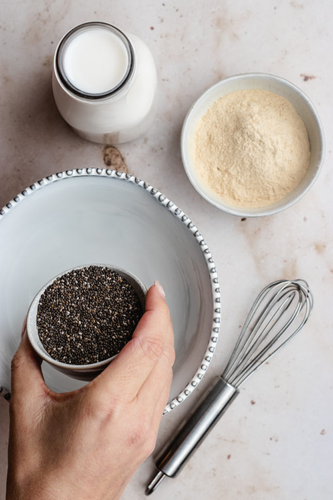 Start by adding the chia seeds to the bowl.