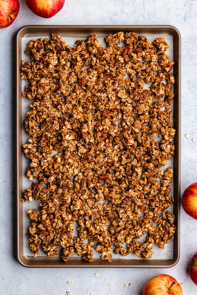 The unbaked granola on a baking tray.