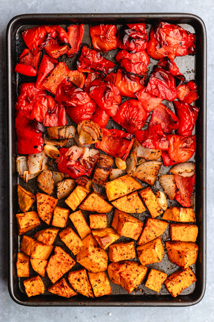 The roasted veggies on a baking tray.