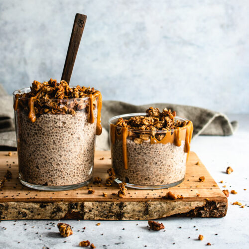 Chai chia pudding topped with peanut butter and granola.