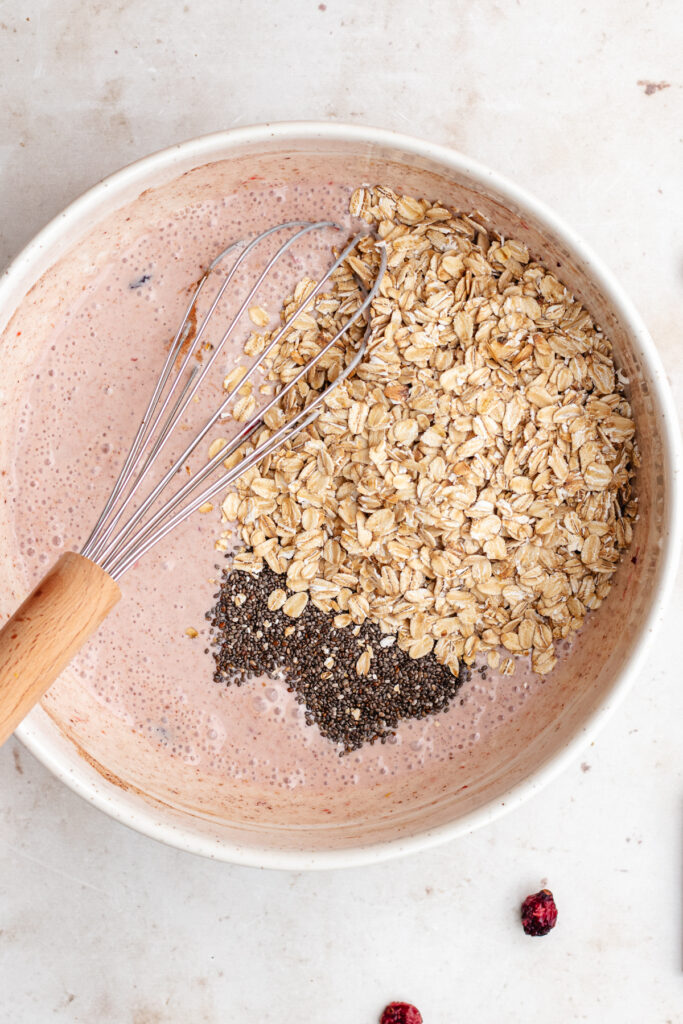 The oats and the chia seeds added to the mixing bowl. 