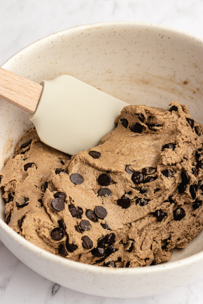 Mixing in the chocolate chips.