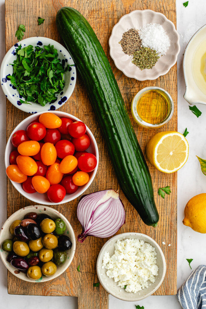 All the ingredients for this Mediterranean tomato and cucumber salad. 