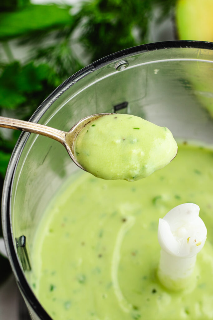 The dressing on a small spoon.