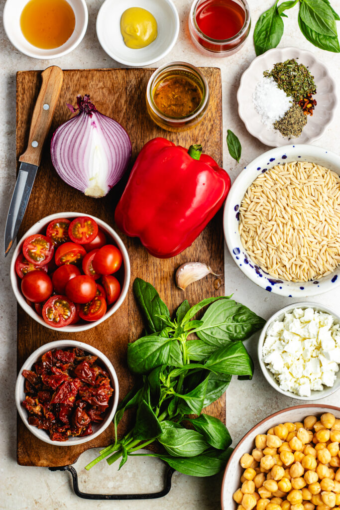 The ingredients on a cutting board and in small bowls.