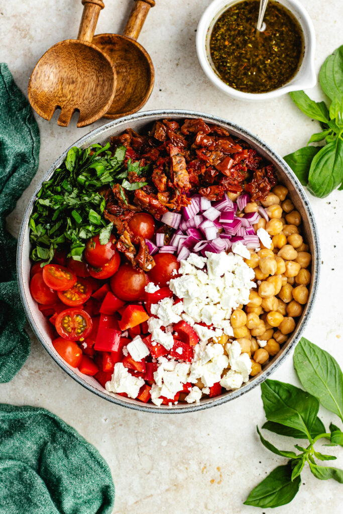 All the ingredients for the salad in a bowl.