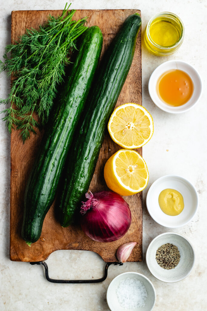 The ingredients for the salad on a cutting board.