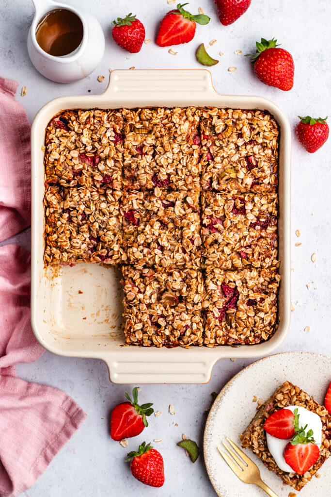 The baked oats cut into pieces, and one pice served on a small plate. 