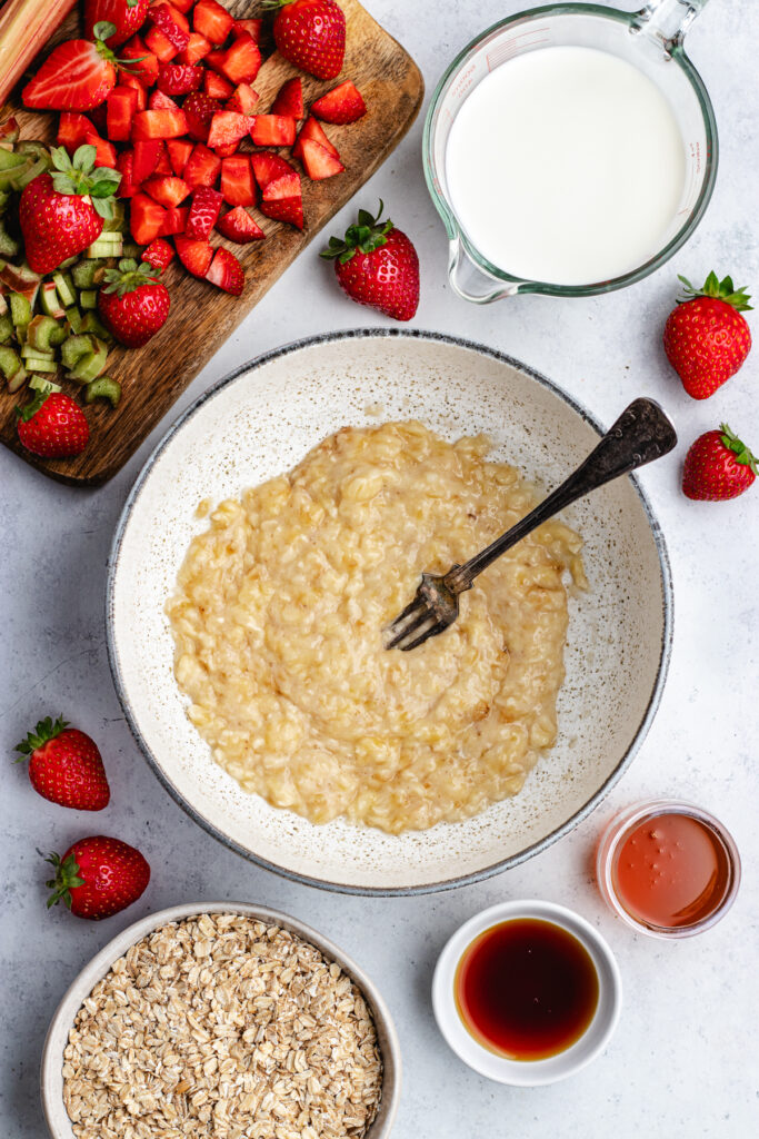 The mashed bananas in a mixing bowl. 