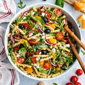 The pasta salad in a large bowl.
