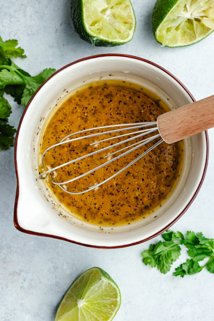 The dressing in a small bowl.