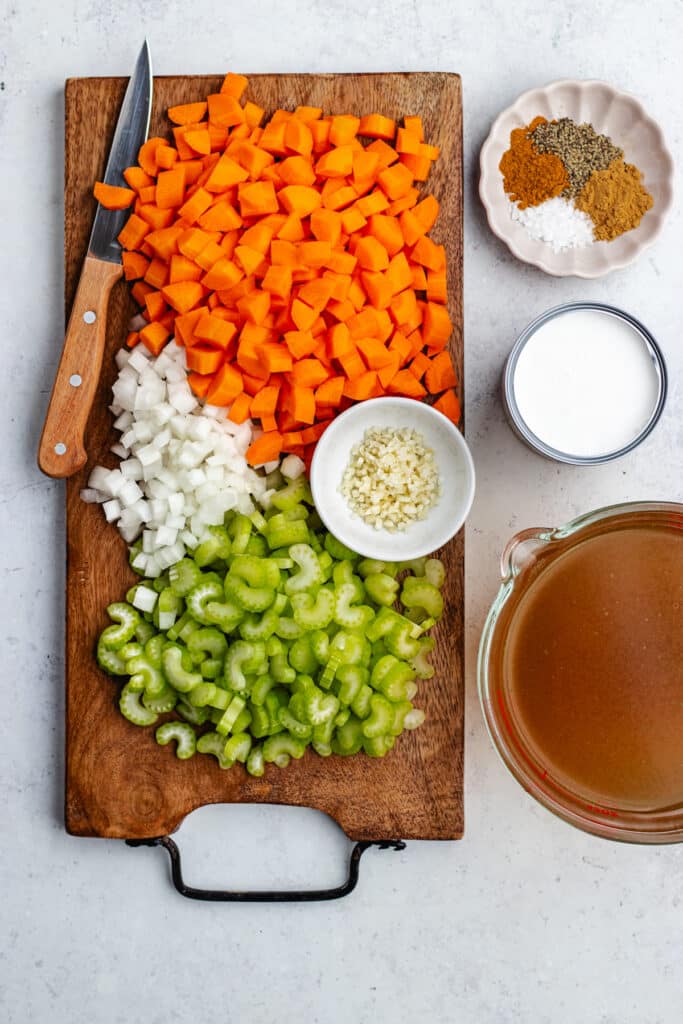The chopped veggies on the cutting board.