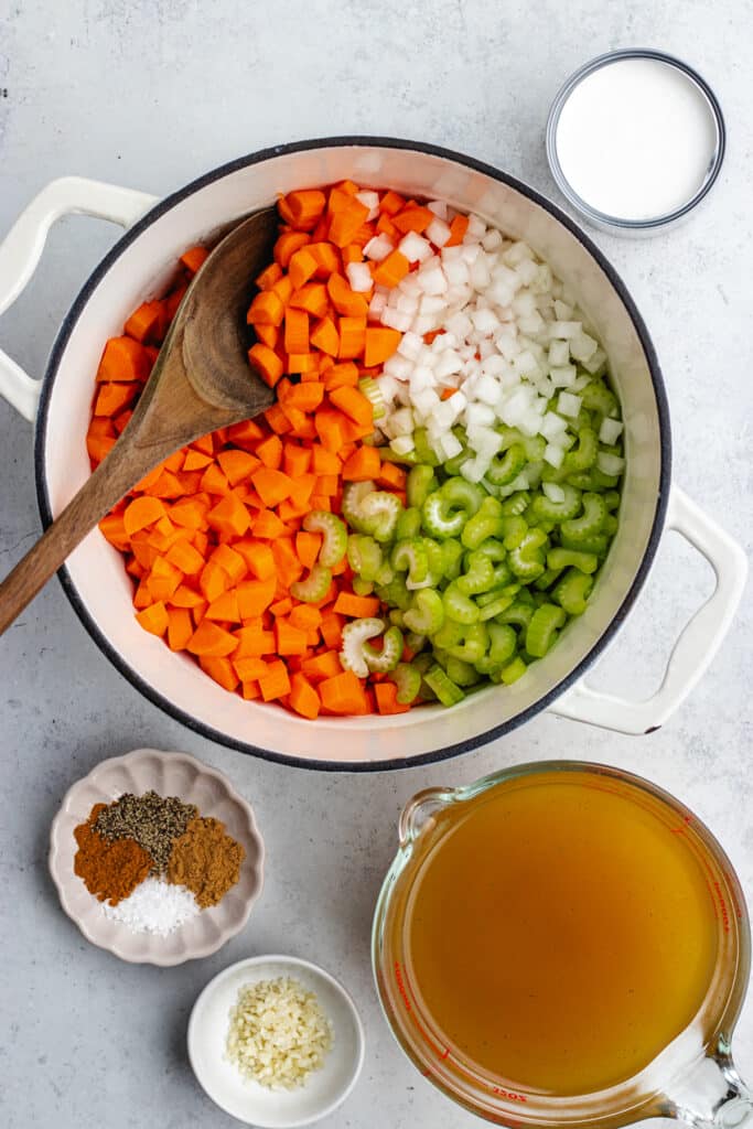 The veggies in a dutch oven pot.