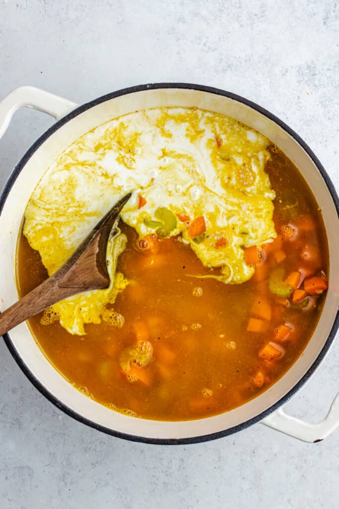 The added coconut milk and vegetable broth.