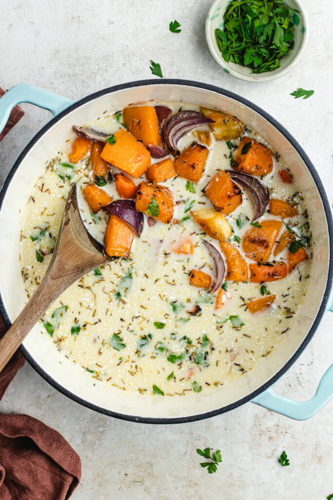 The veggies, vegetable broth and coconut cream in the soup pot.