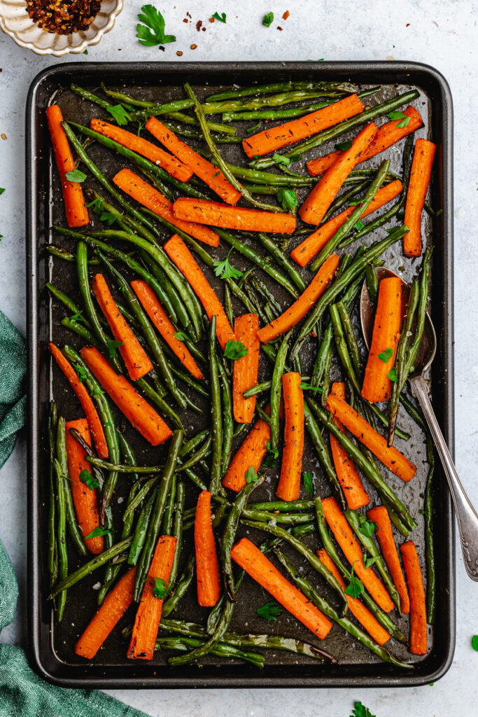 The roasted veggies on the sheet pan.