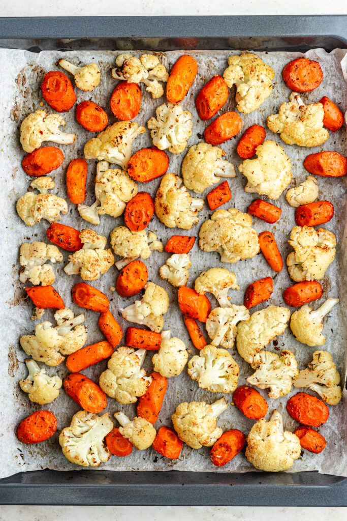The roasted veggies on a sheet pan.