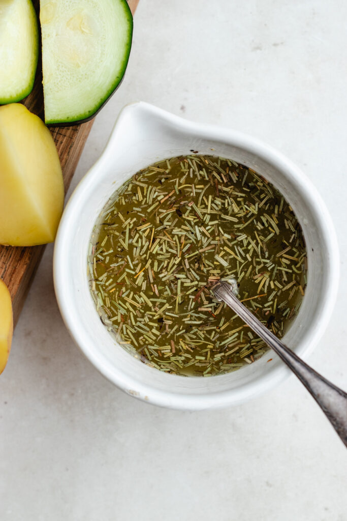 The oil, butter and spices in a small bowl.