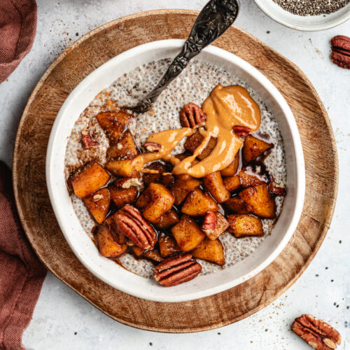 The chia pudding topped with apples, nut butter and pecans.