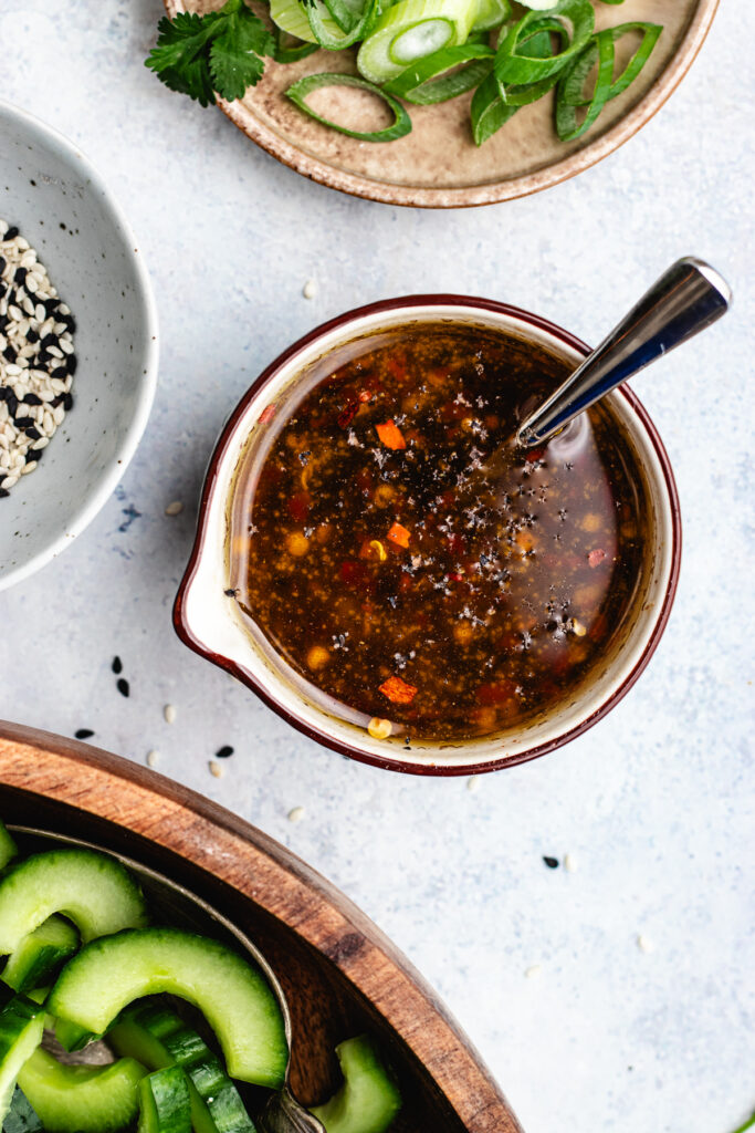 The dressing in a small bowl.