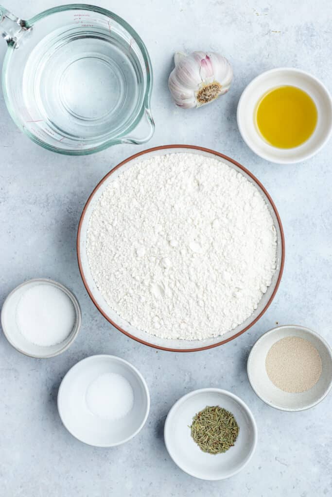 The ingredients for the bread in bowls.