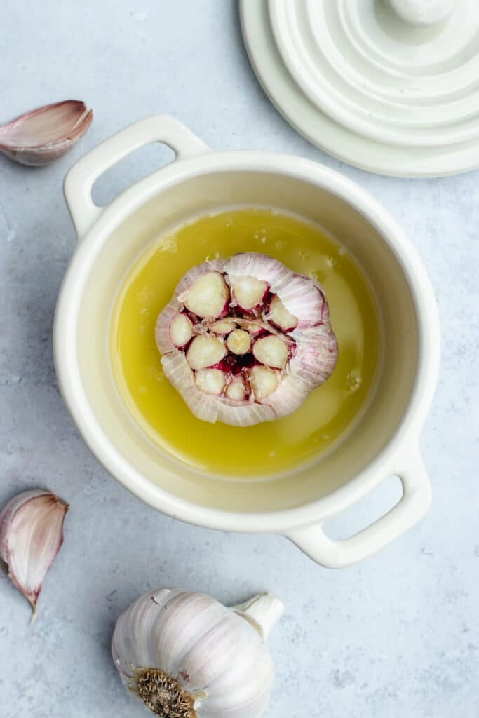 The garlic in a small pot with olive oil and salt.