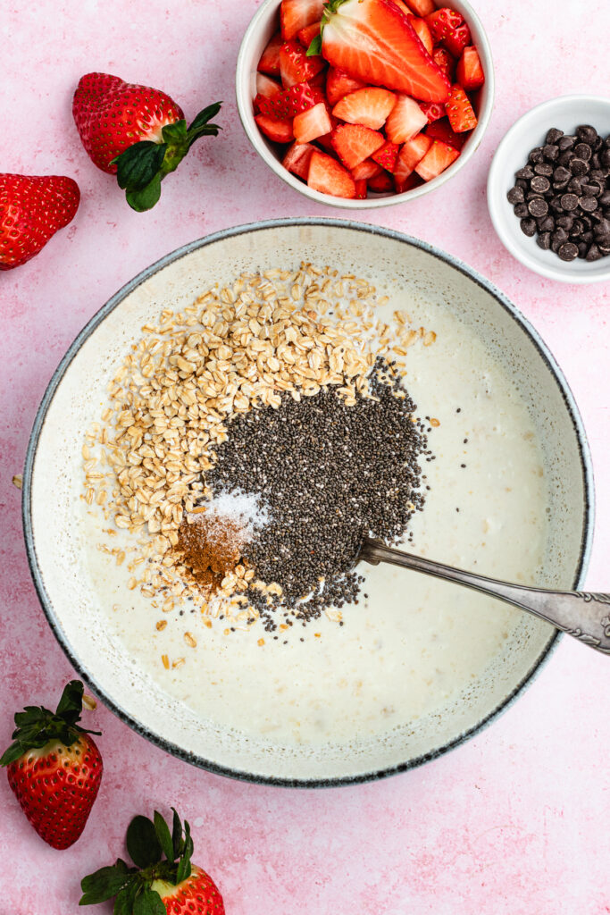 The added rolled oats and chia seeds to the bowl.