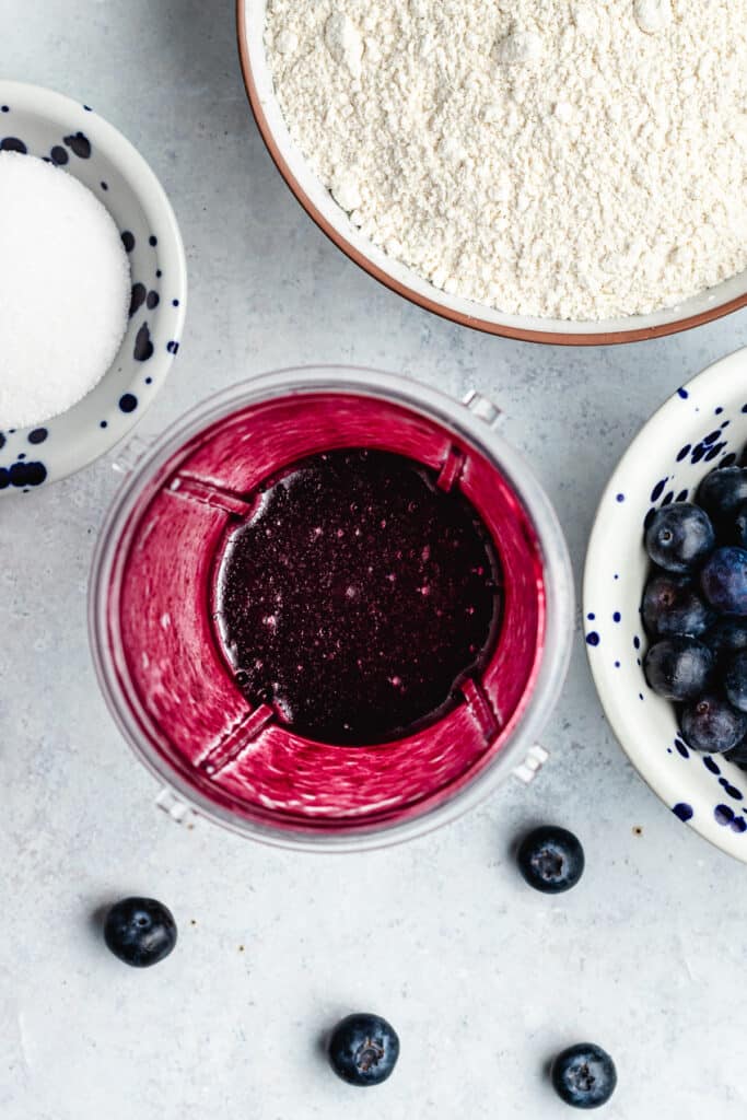 The blueberry purée in a blender.