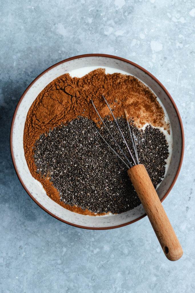 All the ingredients in a bowl with a whisk.