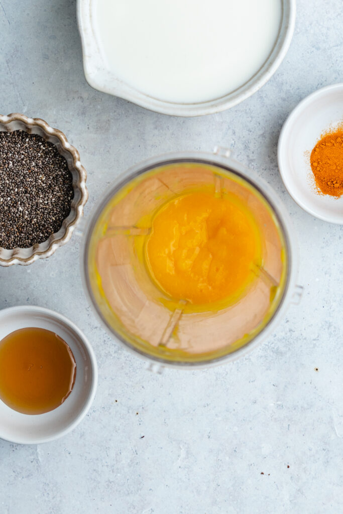 The mango puree in the blender.