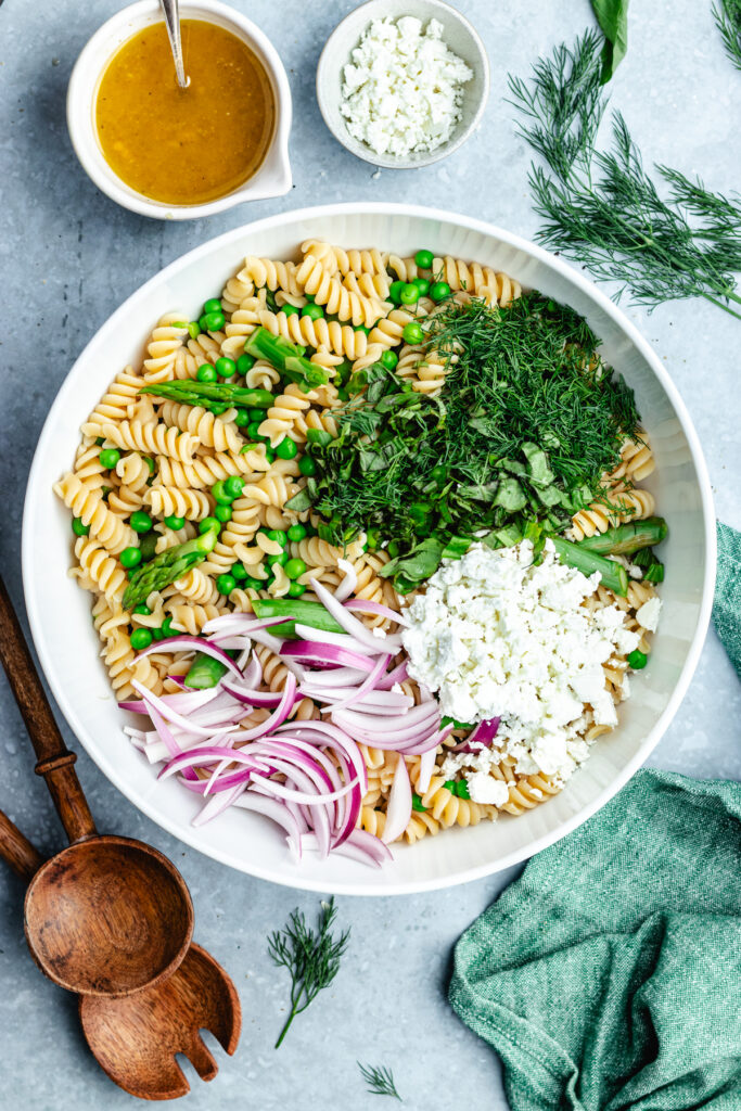 All the ingredients for the salad in a big bowl.