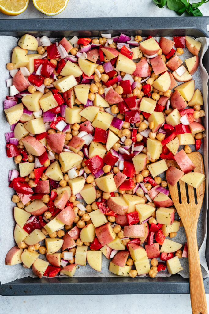 The veggies on a baking sheet lined with parchment paper.