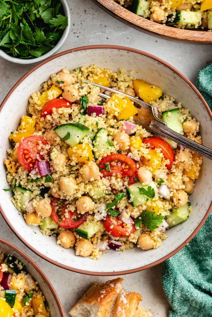 The salad in a bowl with a fork.