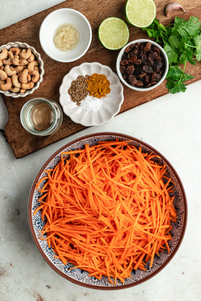 The ingredients in bowls and on a wooden cutting board.