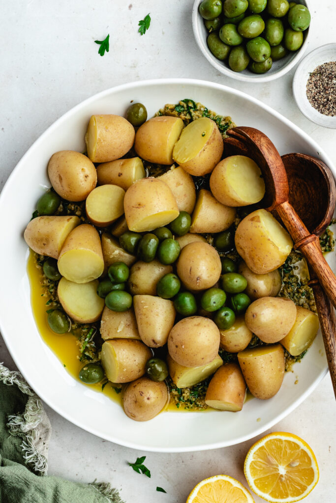 All the ingredients for the potato salad in the serving bowl.