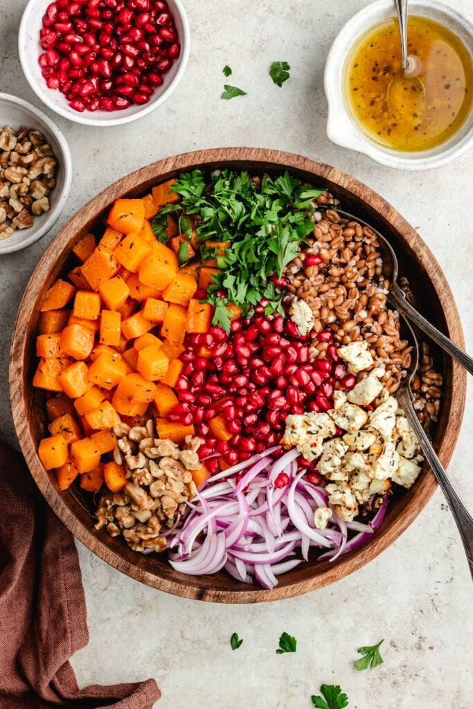 All the ingredients for the salad in a salad bowl.
