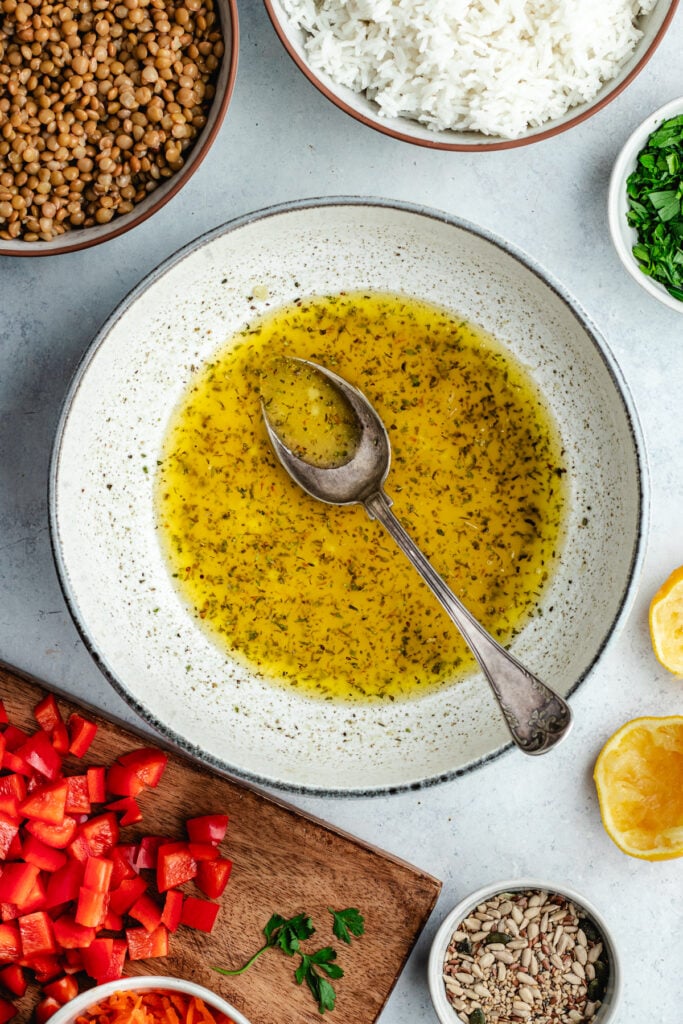 The dressing in a large bowl.